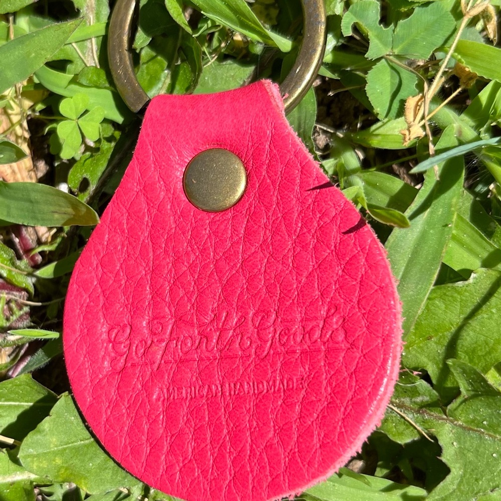 Go forth Goods key chain. Pink